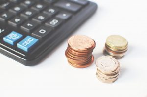 Image of coins and a calculator